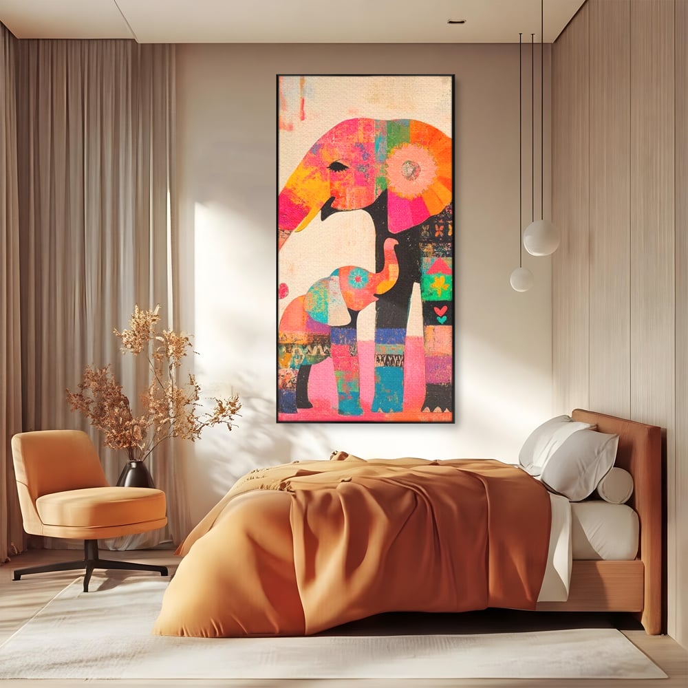 Tablou canvas cu tablou pictura cu elefanti colorati, in rama de aluminiu negru, pe perete intr-un dormitor